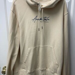 Aeropostale Cream Sweatshirt with Blue Logo